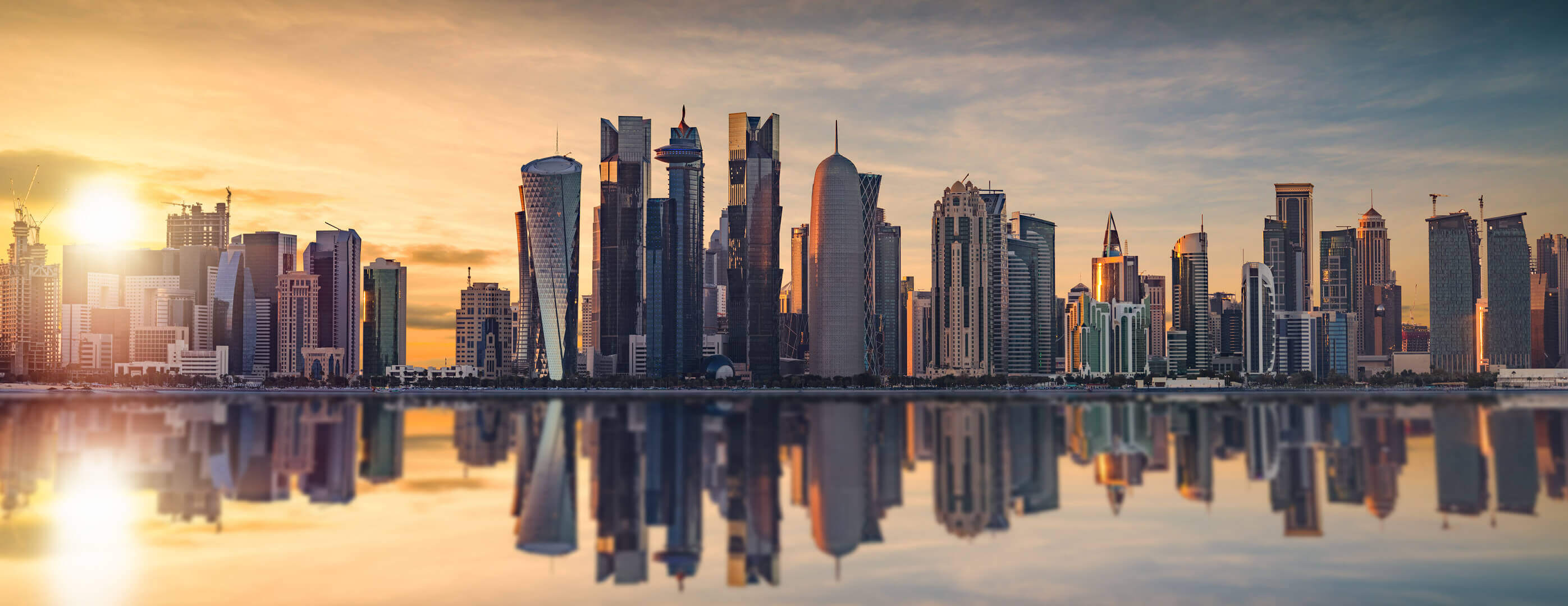The skyline of Doha in Qatar during sunset